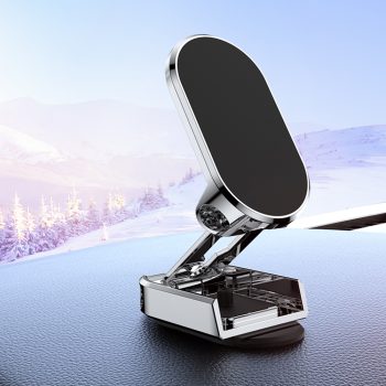 A sleek magnetic car phone mount attached to a car dashboard, securely holding a smartphone in place. The mount features a minimalist design with 360-degree rotation and compact size, suitable for all phone models. Ideal for safe, hands-free driving.